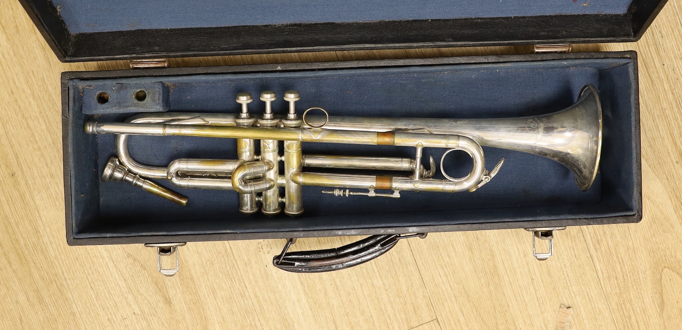 A trumpet and a French Horn (both cased)